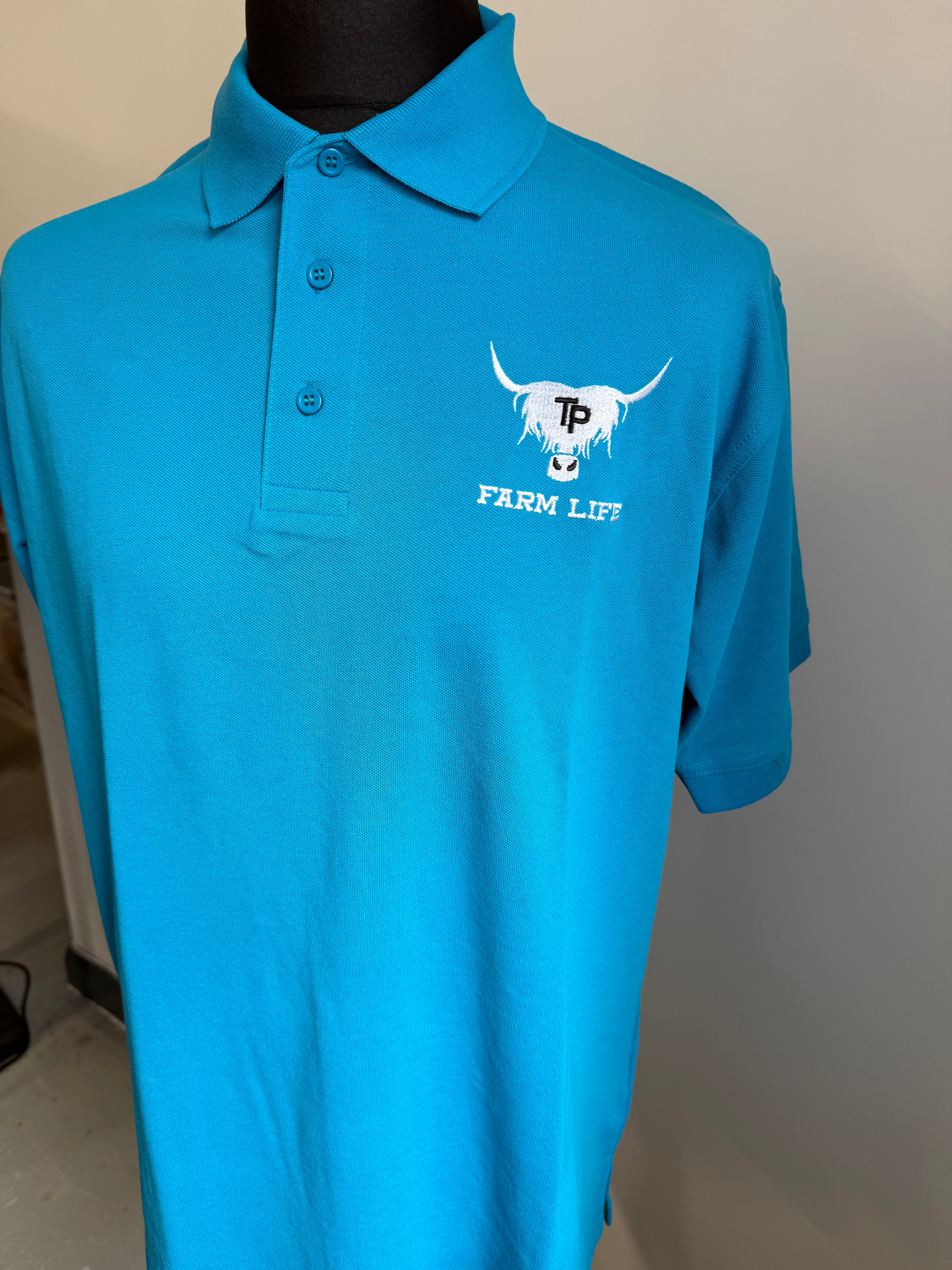 NEW turquoise polo